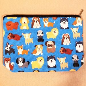 COSMETIC BAG COVERED WITH DOGS